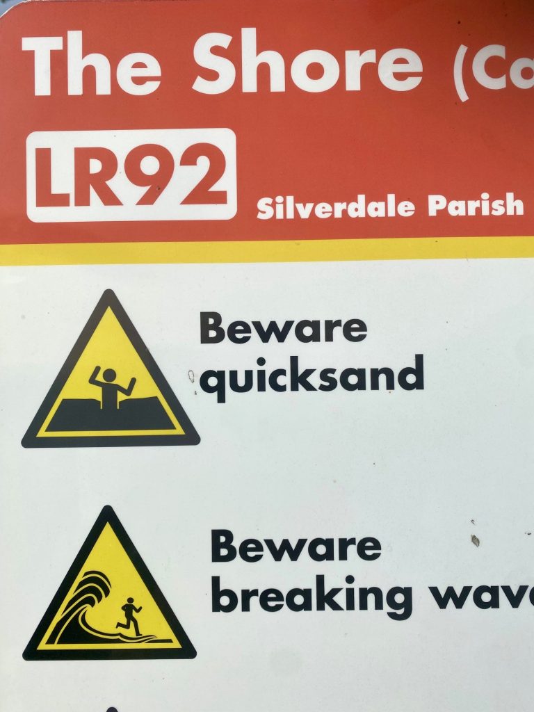 A warning sign at Silverdale Beach