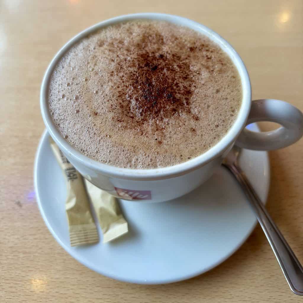 A coffee with foamy milk