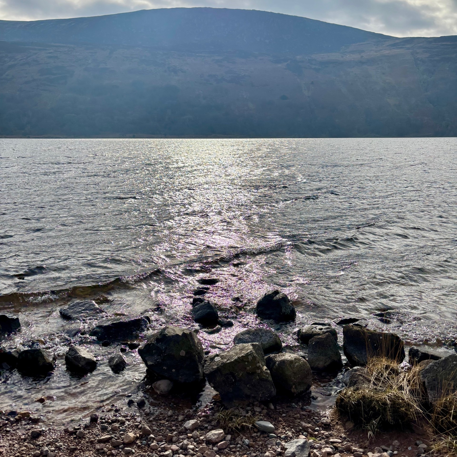A pebble beach on the shore of Ennerdale Water