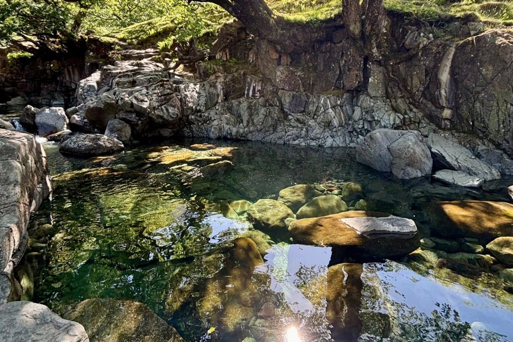 Crystal clear aquamarine water at the Fairy Glen.